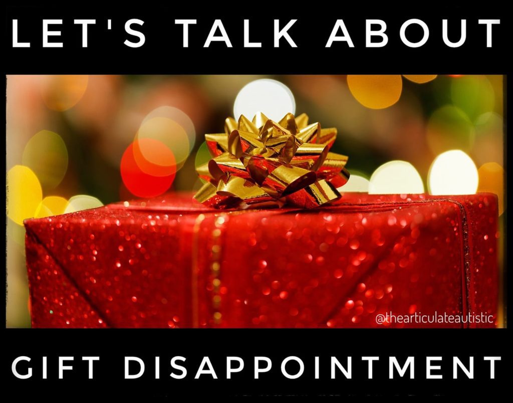 Box wrapped in red, sparkly wrapping paper with a gold bow on top with text that reads, "Let's talk about gift disappointment".