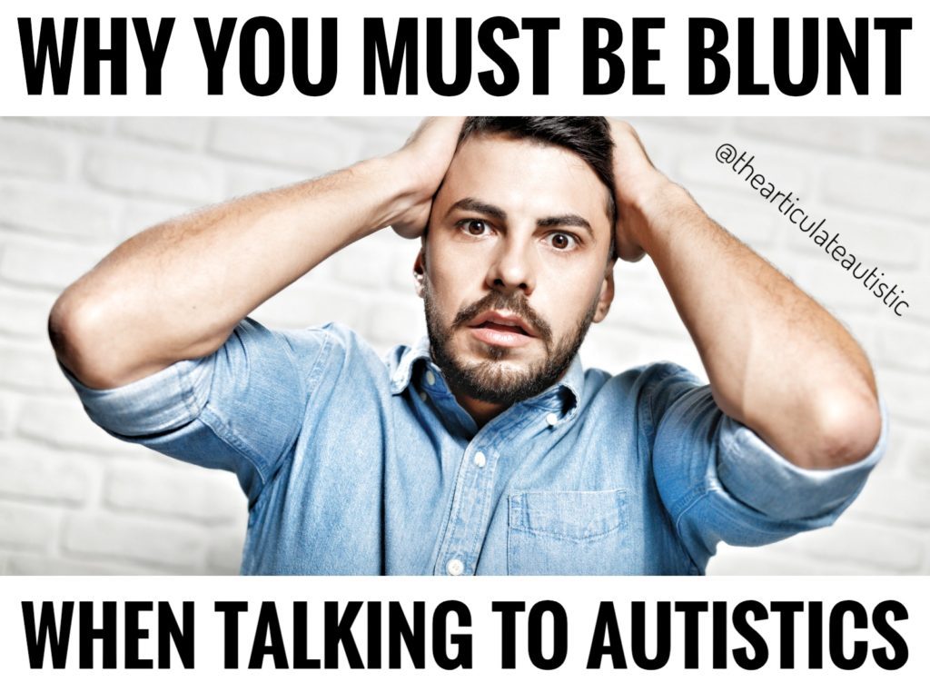 Young man with brown eyes, a beard, and a blue shirt looking upset, shocked, and confused